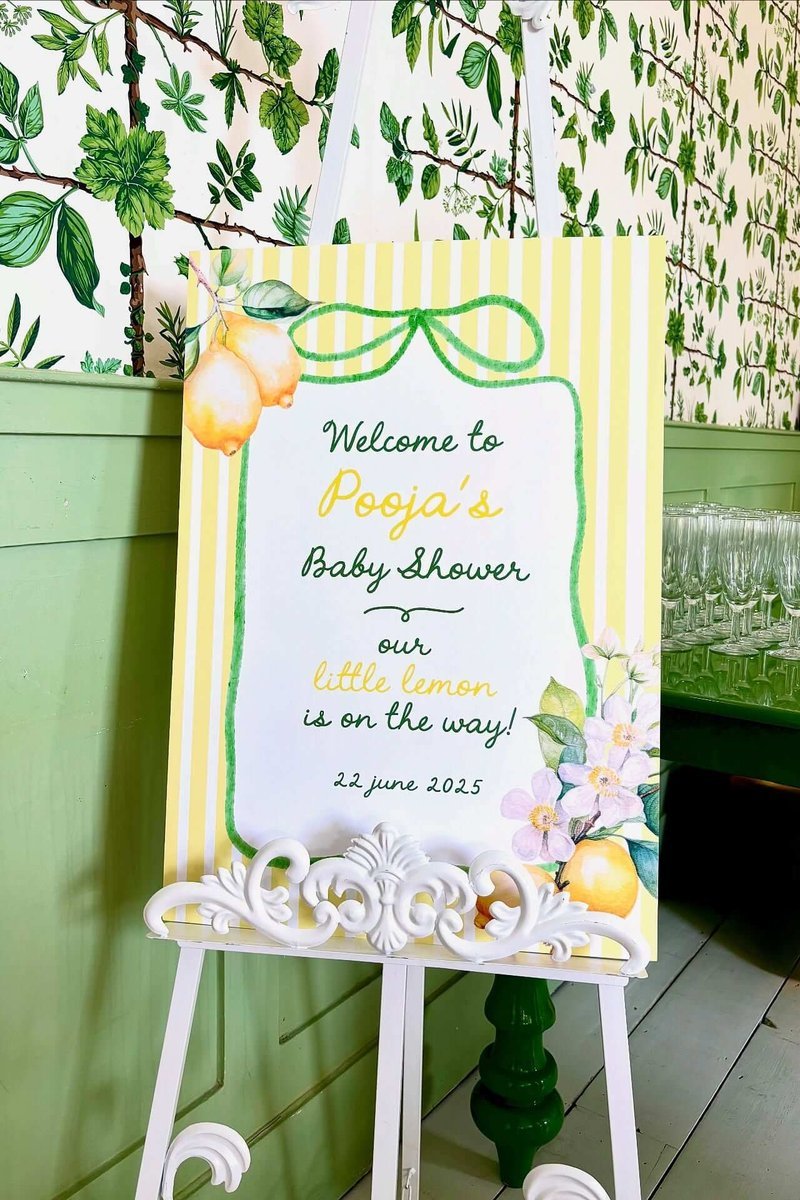 Striped Welcome Sign with a Green Bow
